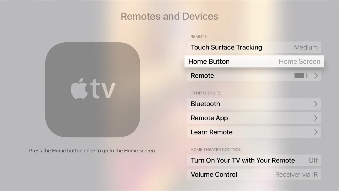 Pulsante Home del telecomando Apple TV per accedere allo schermo