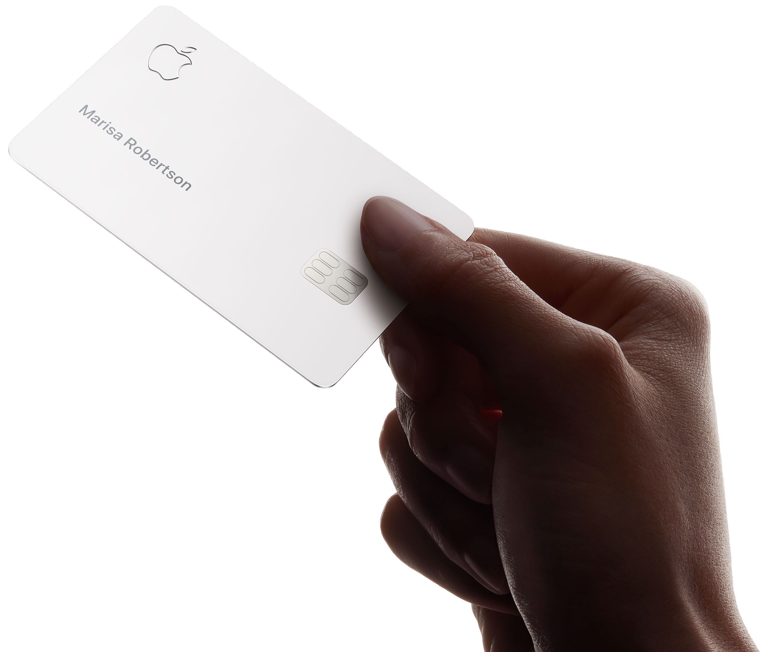 Persona in possesso di carta Apple in titanio fisico